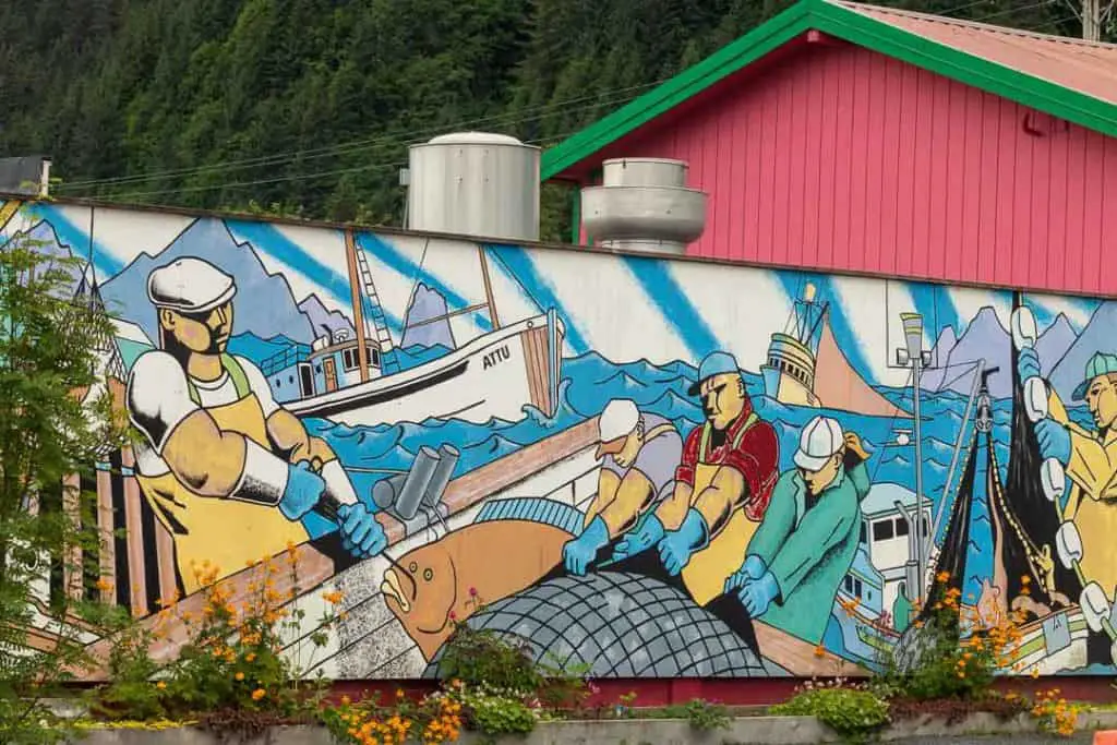 A mural of fishermen in downtown Seward tells the story of the town