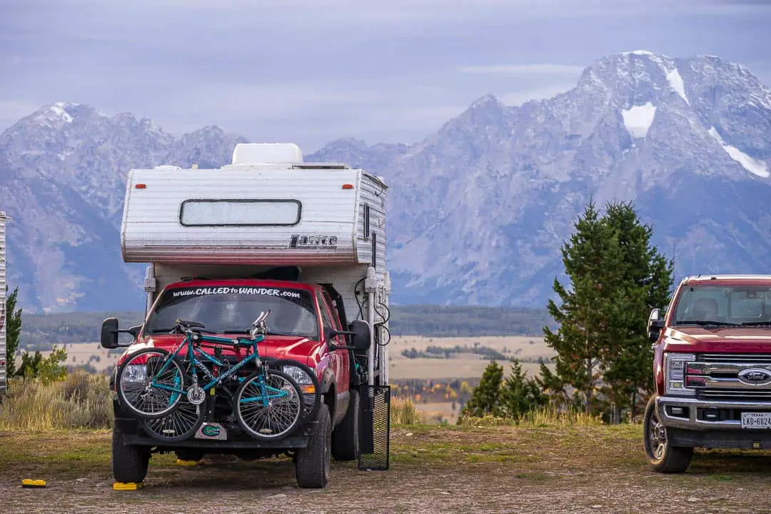 Camping with views of a mountain range in the background