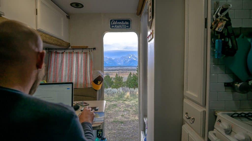 Working in camper with views of Grand Tetons