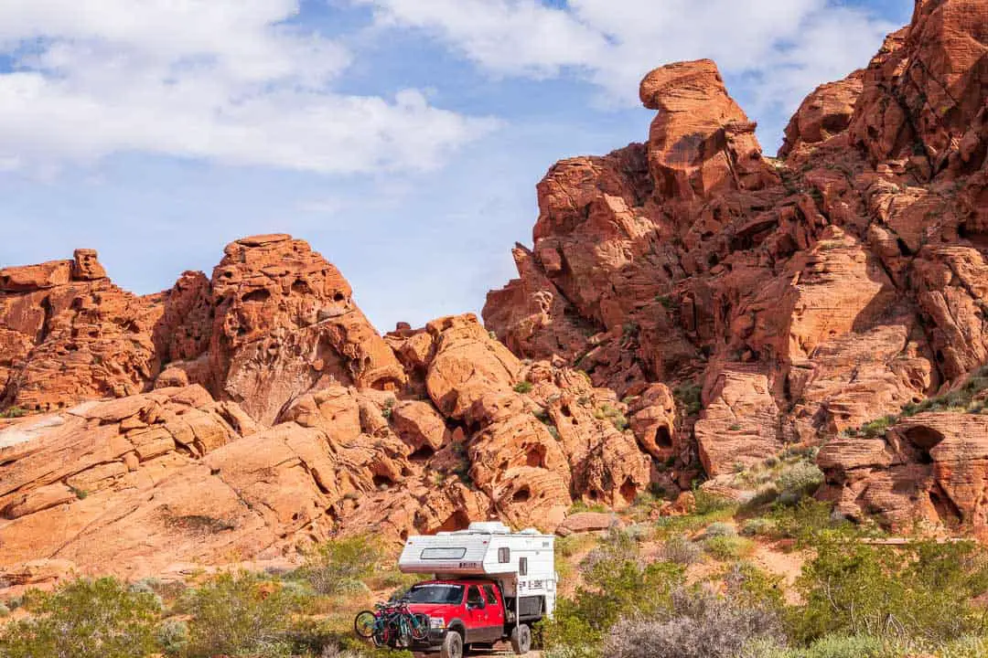 truck camper camping among red rocks