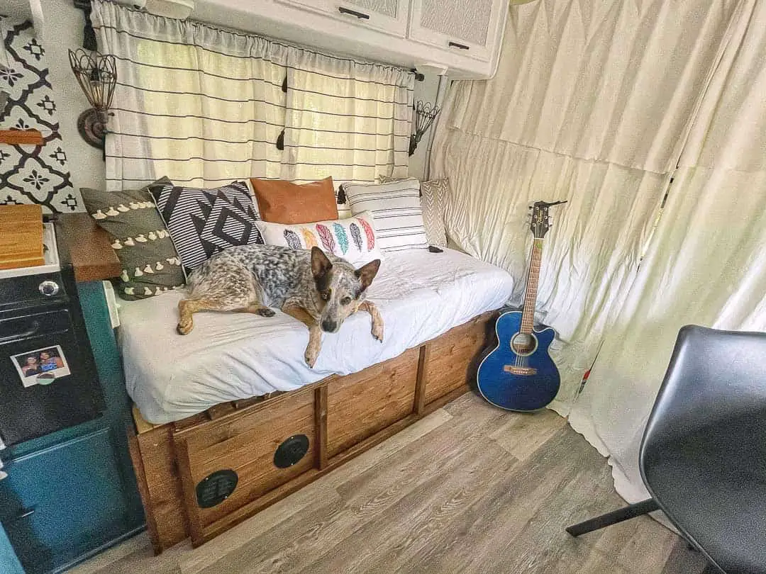 Dog laying on a DIY build couch in a RV